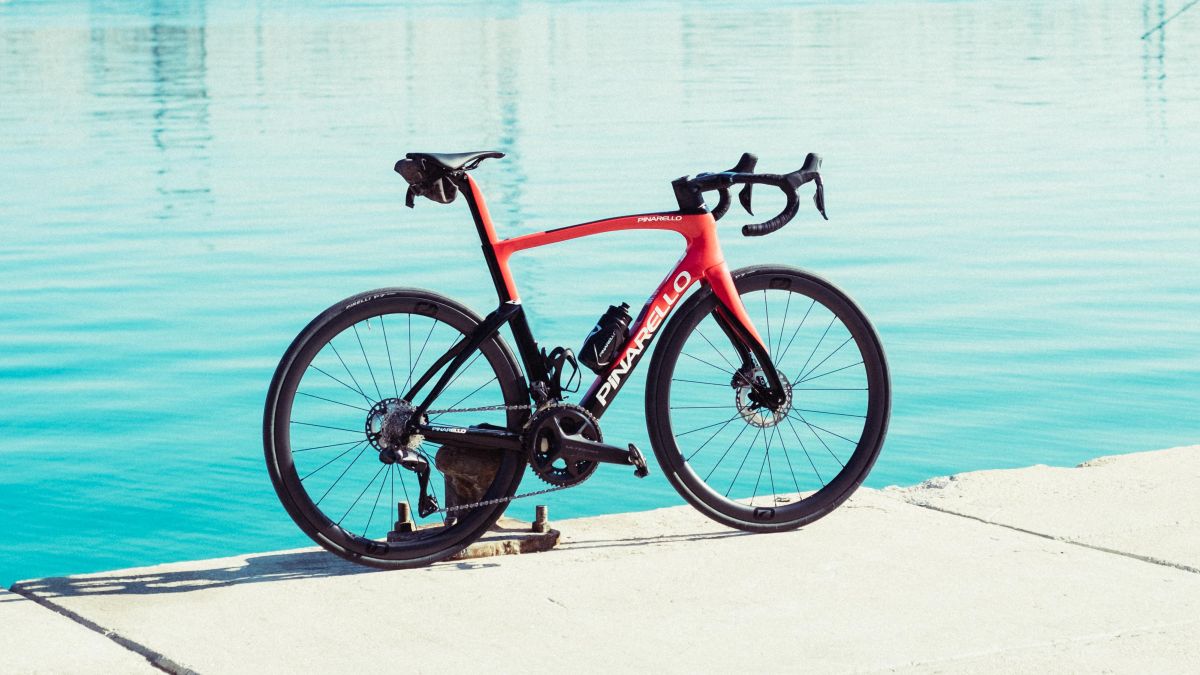 A red and black pinarello F road bike