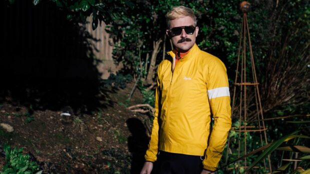 A yellow rapha core waterproof jacket