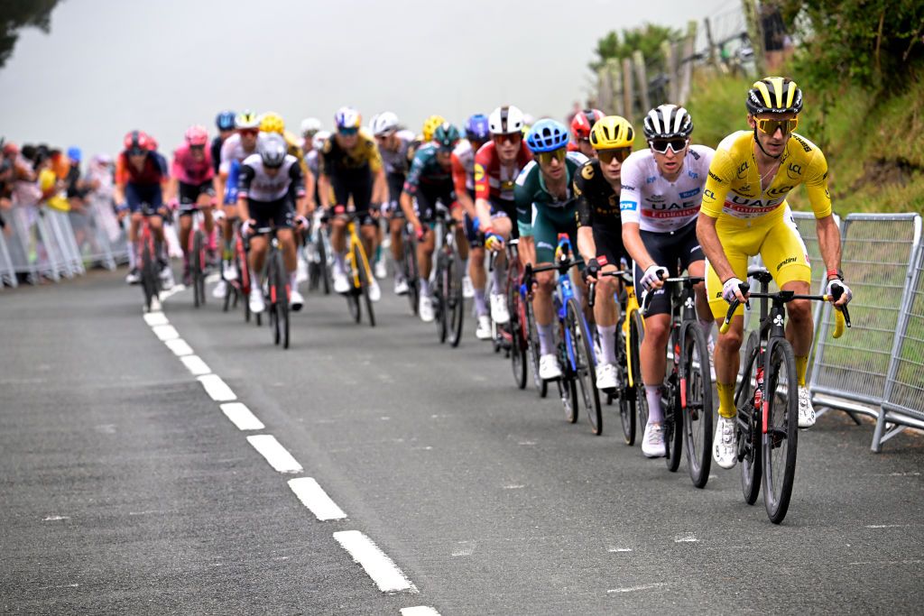 Tour de France stage 2: Race leader Adam Yates leads out teammate Tadej Pogacar for the time bonus sprint on Jaizkibel