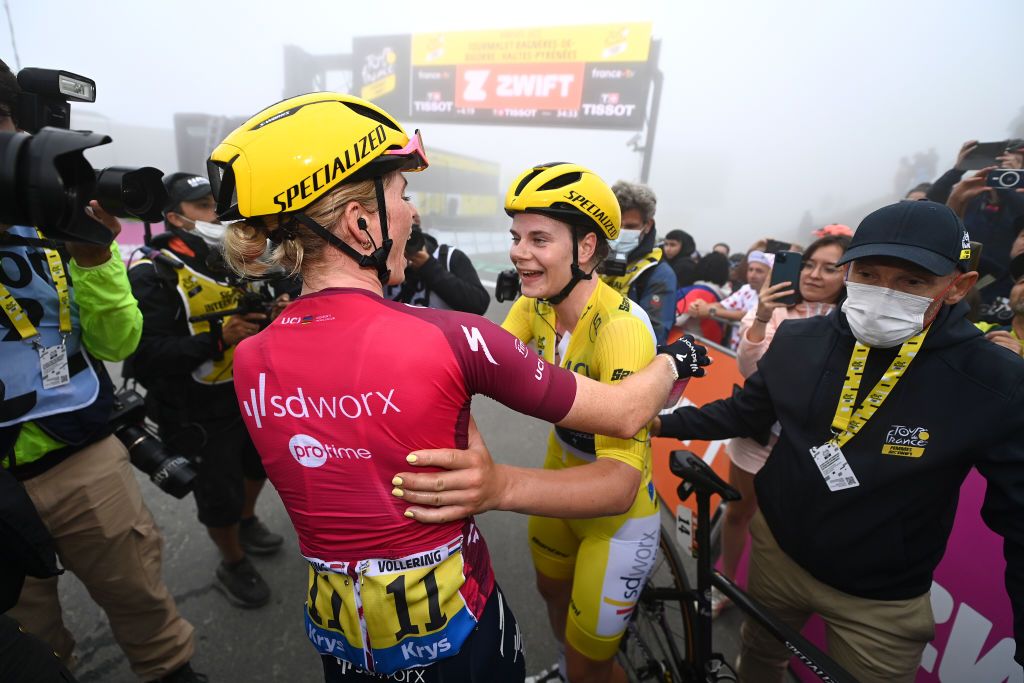 Demi Vollering and Lotte Kopecky celebrate at the top of the Tourmalet at the Tour de France Femmes