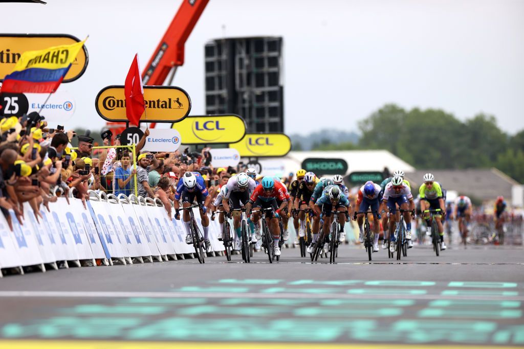 Jasper Philipsen, Phil Bauhaus, Caleb Ewan and Mark Cavendish sprinting on stage 4 at the Tour de France
