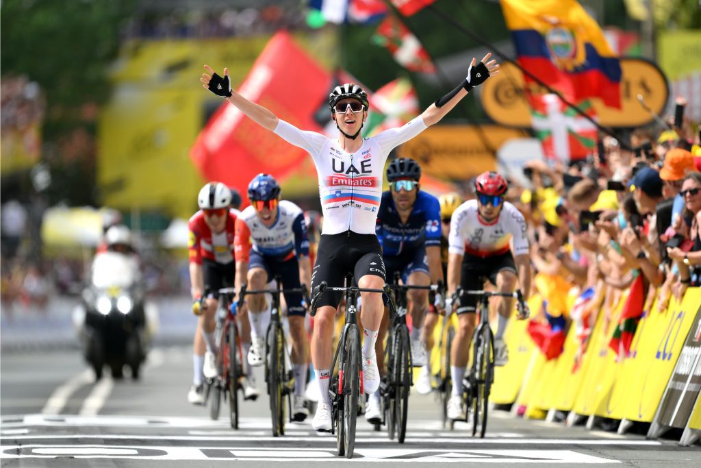 Tour de France: Tadej Pogacar celebrates taking third on stage 1 behind teammate Adam Yates who won in Bilbao, Spain