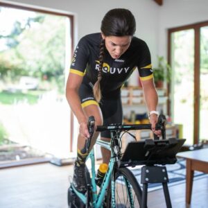 A female riding using an indoor trainer