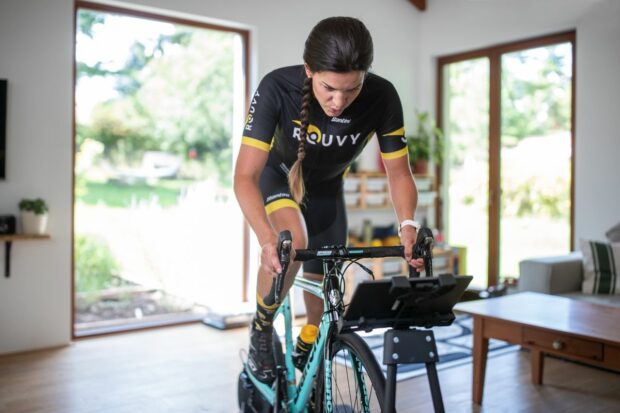 A female riding using an indoor trainer