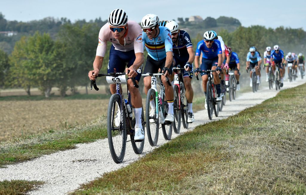 Dutch rider Mathieu Van Der Poel rides ahead of Belgian rider Greg Van Avermaet during the first edition of the UCI Gravel World Championships 2022 between Vicenza and Cittadella northern Italy on October 9 2022 Photo by Massimo Fulgenzi AFP Photo by MASSIMO FULGENZIAFP via Getty Images
