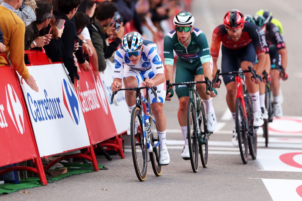 Remco Evenepoel leads Kaden Groves and Filippo Ganna in the late attack during stage 21 of the 2023 Vuelta a España