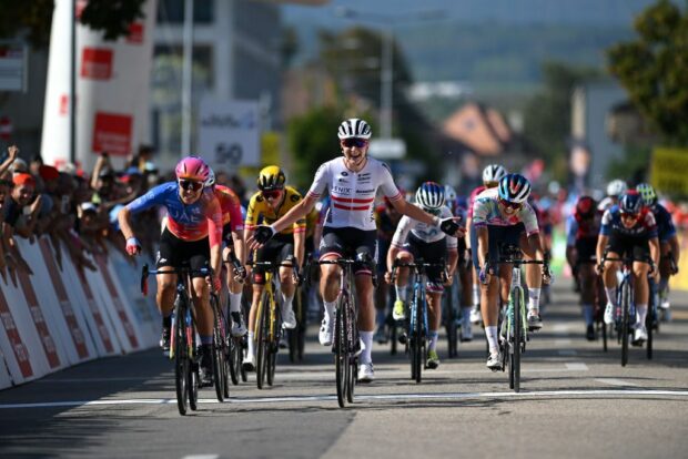 Sofia Bertizzolo (L) passes Carina Schrempf at the line on stage 1 of Tour de Romandie