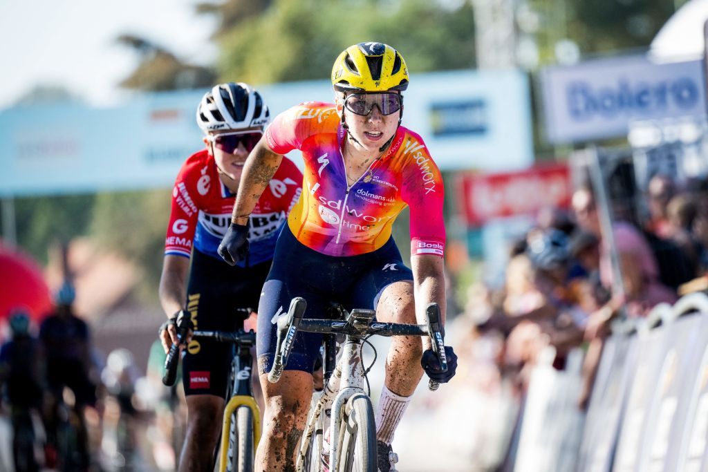 Dutch Lorena Wiebes celebrates as she crosses the finish line to win the womens elite race at the European Gravel cycling Championships in Heverlee on October 1 2023 Photo by JASPER JACOBS Belga AFP Belgium OUT Photo by JASPER JACOBSBelgaAFP via Getty Images