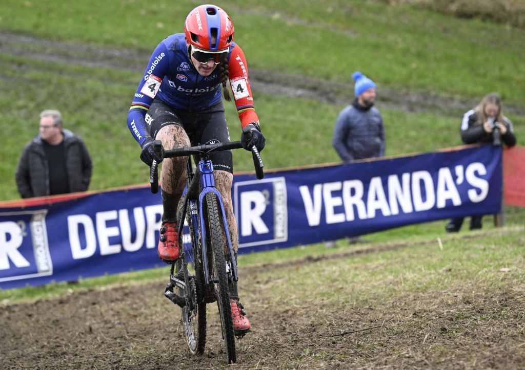 Dutch rider Lucinda Brand climbs a slope during the womens elite race at the World Cup cyclocross cycling event in Dendermonde on November 12 2023 stage 3 out of 14 of the UCI World Cup cyclocross competition Photo by Tom Goyvaerts Belga AFP Belgium OUT Photo by TOM GOYVAERTSBelgaAFP via Getty Images