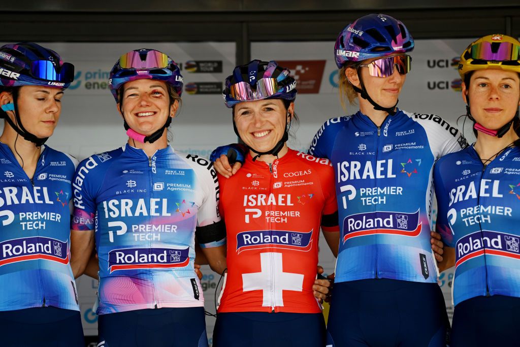 Austrian time trial champion Anna Kiesenhofer with Israel Premier Tech Roland teammates at Tour de Suisse Women team presentation in 2023