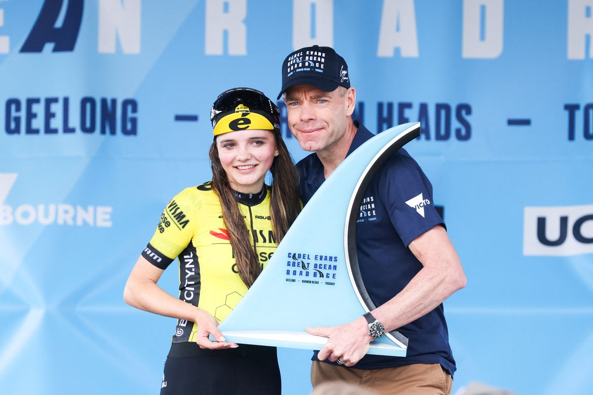 Rosita Reijnhout (Visma-Lease a Bike on the podium with Cadel Evans