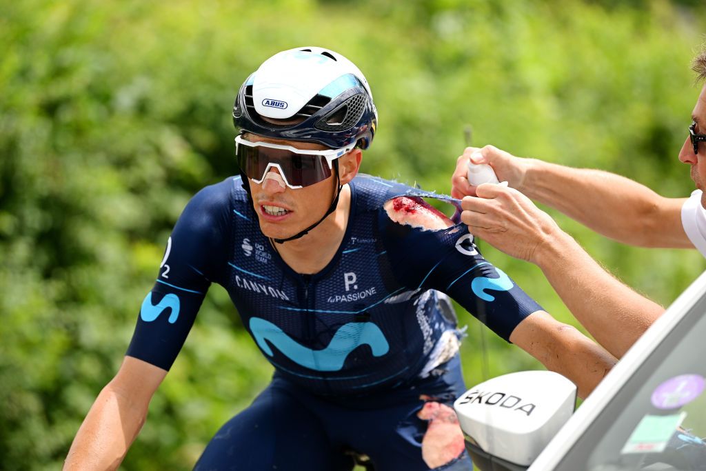 CHAINTRE FRANCE JUNE 09 Enric Mas Nicolau of Spain and Movistar Team is assisted by the medical team after h fall during the 74th Criterium du Dauphine 2022 Stage 5 a 1623km stage from ThizylesBourgs to Chaintr WorldTour Dauphin on June 09 2022 in Chaintre France Photo by Dario BelingheriGetty Images