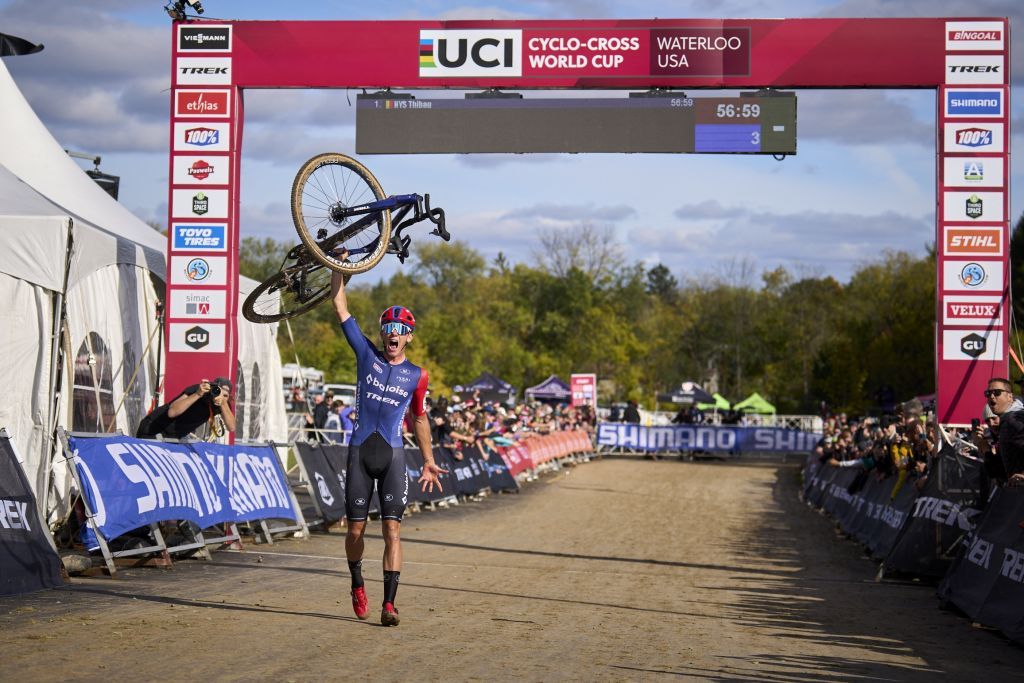 Belgian Thibau Nys celebrates as he crosses the finish line to win the first round of the UCI World Cup Cyclocross competition in Waterloo Wisconsin