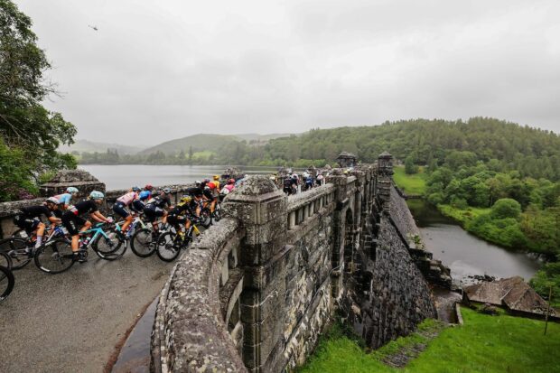Picture by Alex Whitehead/SWpix.com - 09/06/2022 - Cycling - The Womenâs Tour 2022 - Stage Four - Wrexham to Welshpool, Wales - The Peloton passing over Lake Vyrnwy Dam