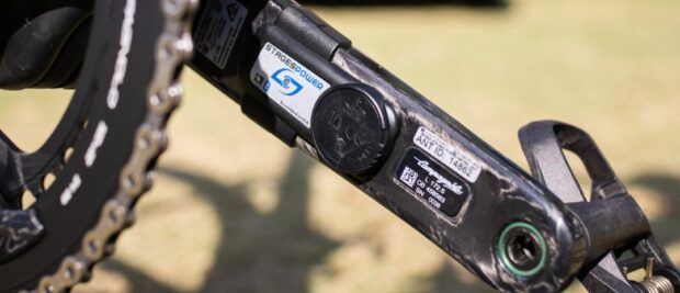 A closeup of the Stages crank power meter on a bike