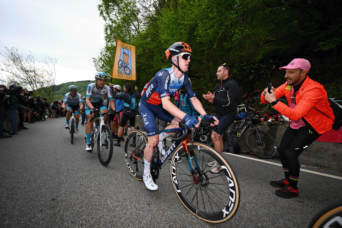 Dunbar makes his way up the climb to Oropa with his knee bloodied from the crash