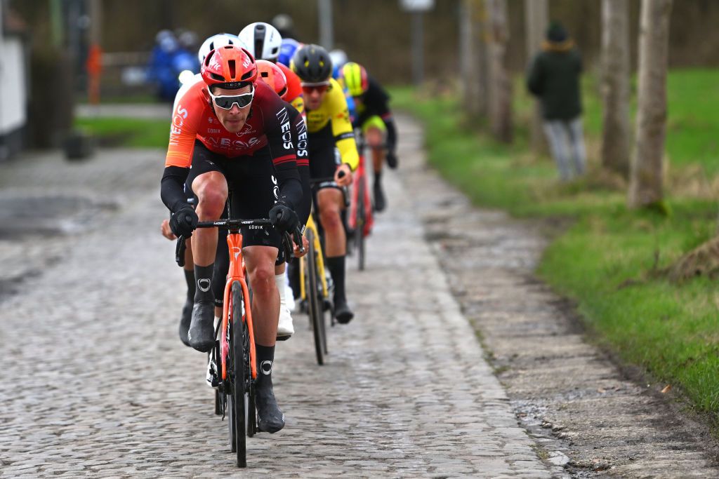 Luke Rowe (Ineos Grenadiers) racing on the cobbles at Omloop Het Nieuwsblad