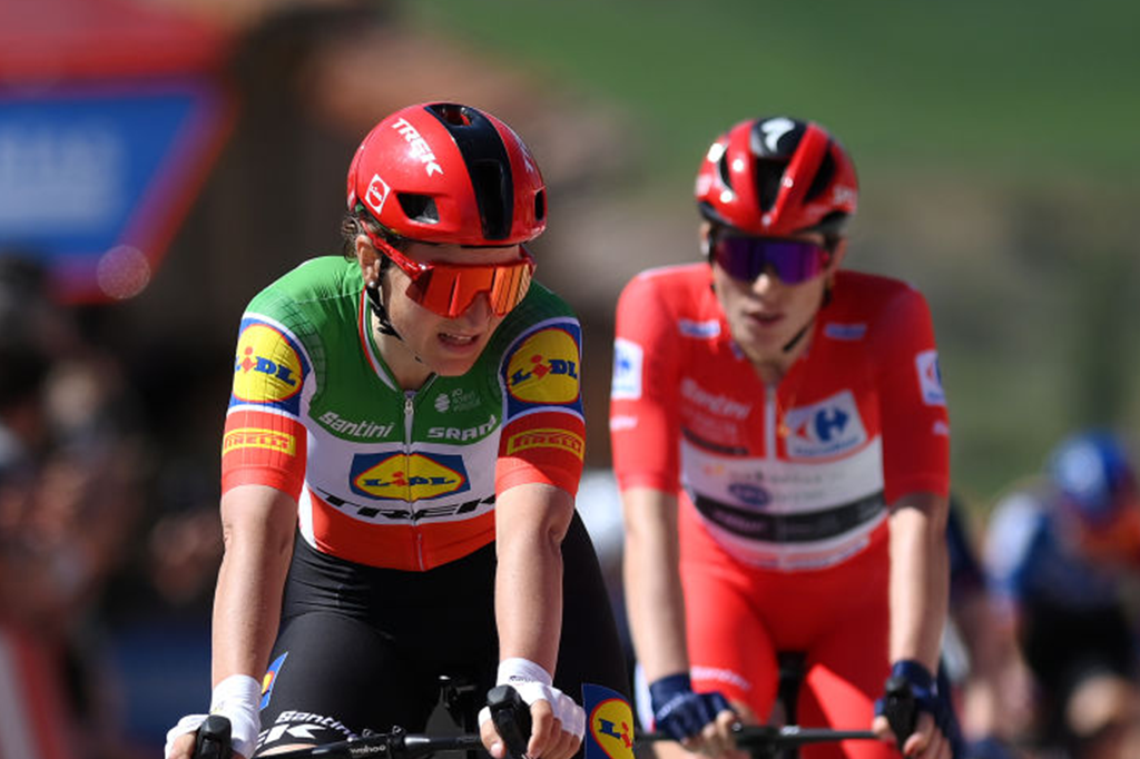 Elisa Longo Borghini (Lidl-Trek) crosses the line in third on stage 7 of La Vuelta Femenina with attentive race leader Demi Vollering (SD Worx-Protime) close behind in fourth