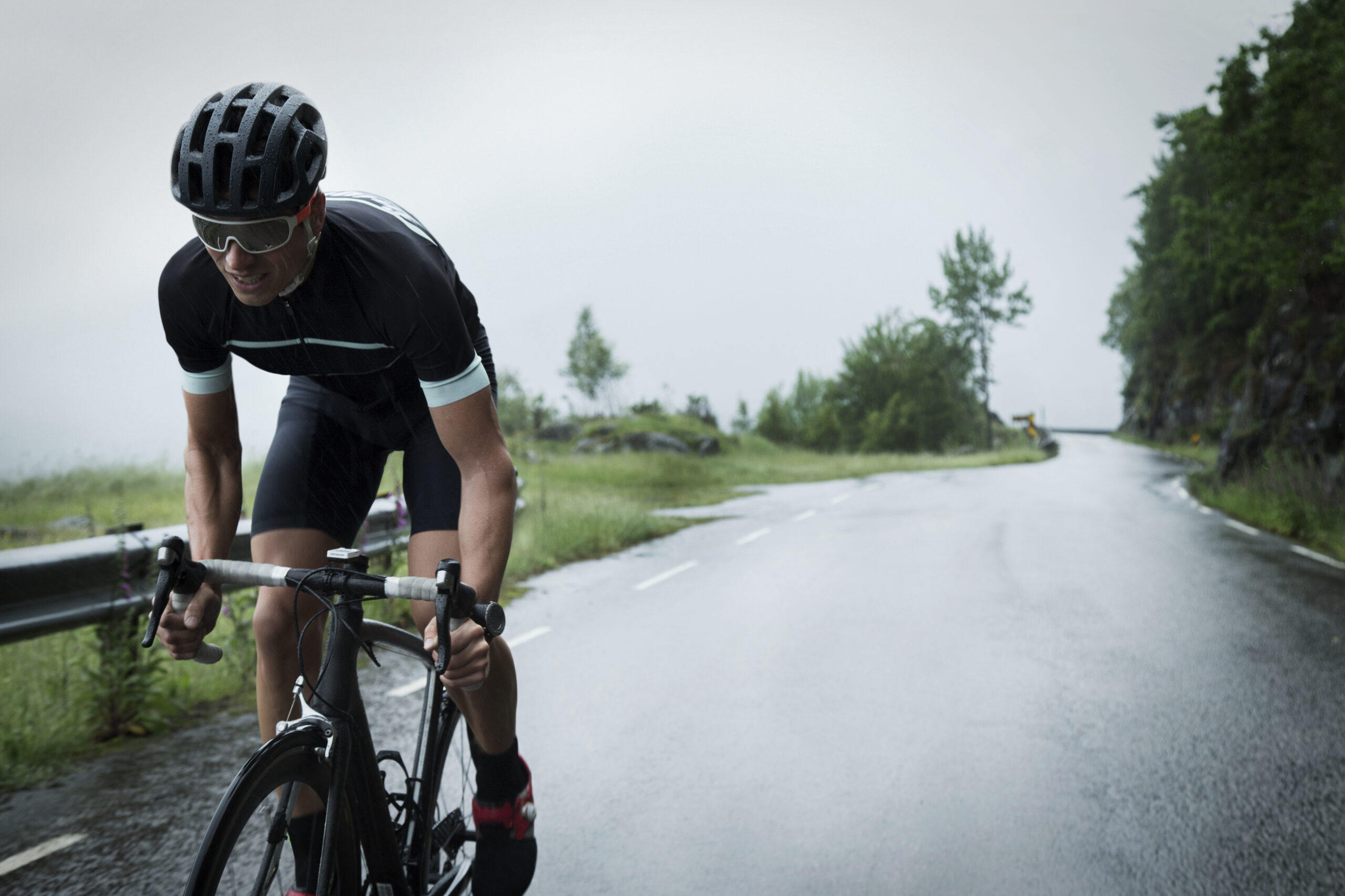male road cyclist mountain road