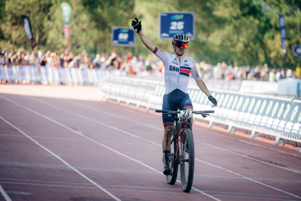 Tom Pidcock crosses the finish line at the European Championships