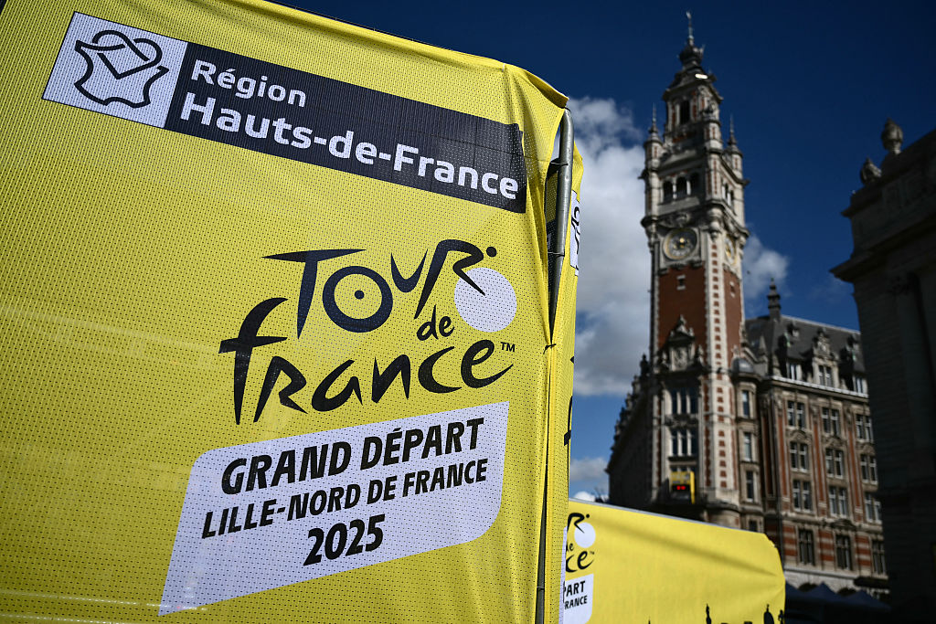 Signage indicates the fan park and team presentation area in central Lille, near the Beffroi de Lille days prior to the start of the 112th edition of the Tour de France cycling race, in Lille, northern France, on July 3, 2025.
