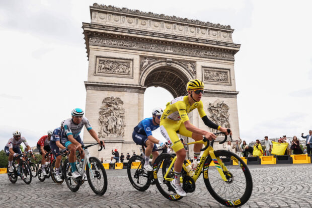 Tadej Pogačar passes the Arc de Triomphe on stage 21 of the 2025 Tour de France