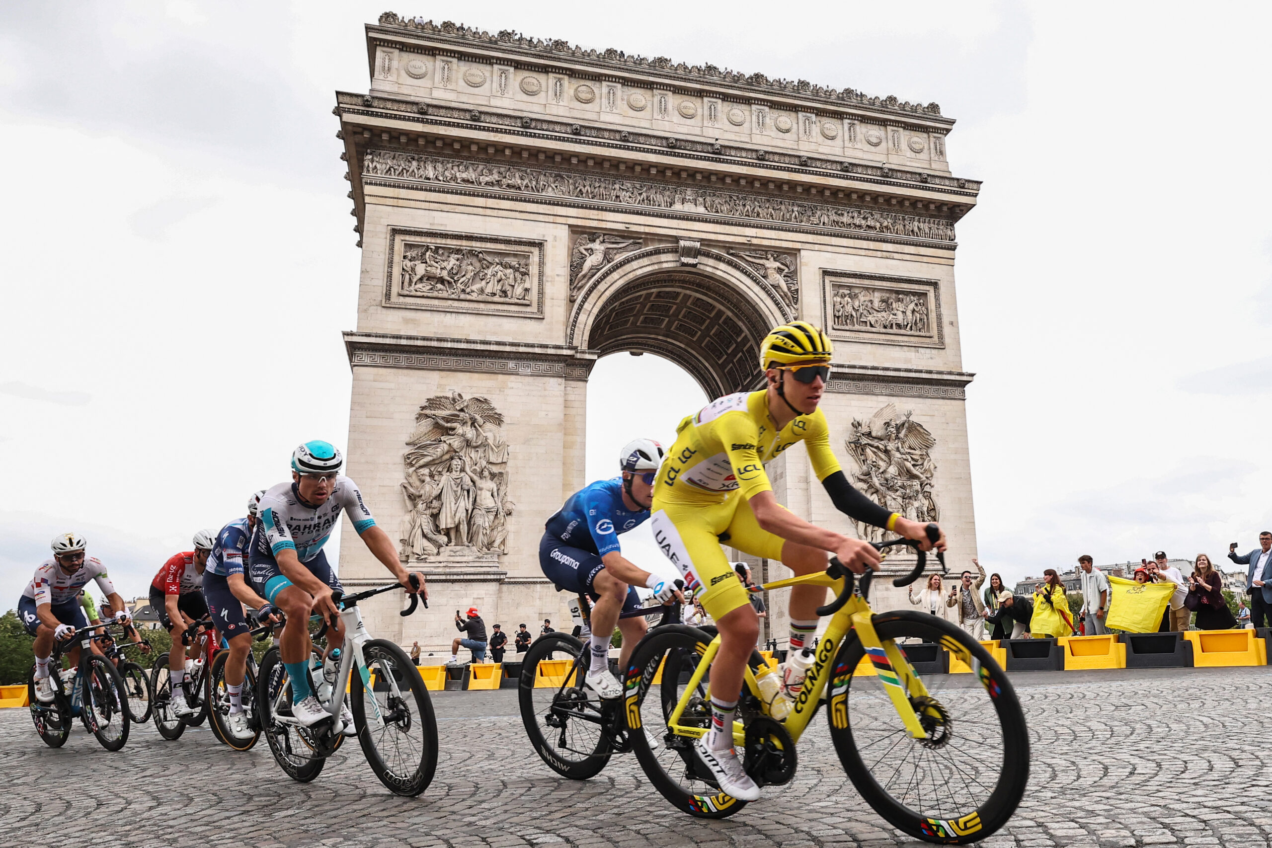 Tadej Pogačar passes the Arc de Triomphe on stage 21 of the 2025 Tour de France