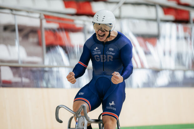 Matthew Richardson of Great Britain celebrates after setting a world record breaking time of 8.941s in the UCI Men Elite 200m Flying Lap Record Attempt