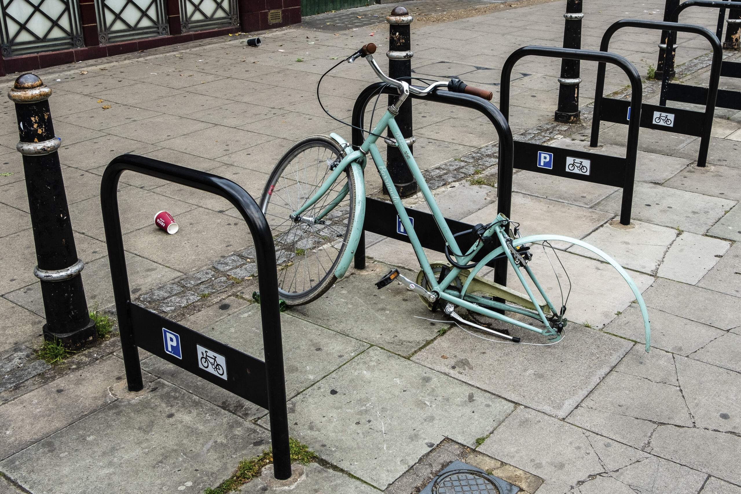A bicycle from which the saddle and back wheel have been removed is pictured in Kilburn on 26th May 2022 in London, United Kingdom.