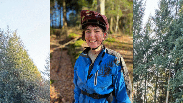 woman laughs after crash with woodland background