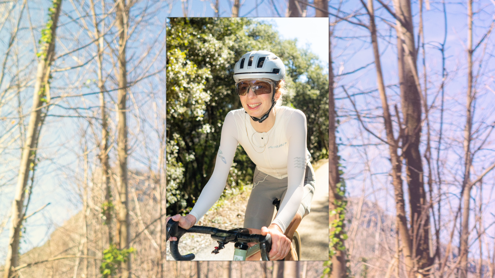 Millie cycles against a woodland background