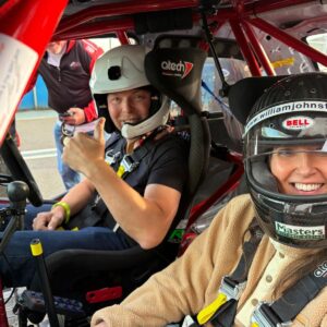 Kim Borthwick with Chris Hoy in a racing car