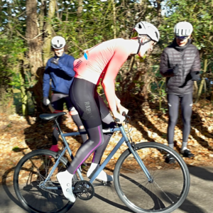 A rider competing on a single-speed bike in a hill-climb competition