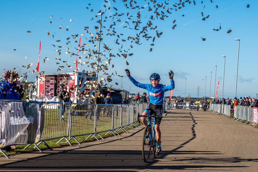 A young rider wins a cyclo-cross race at Cyclopark